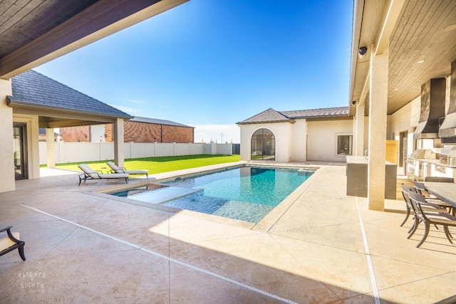 view of swimming pool with a patio