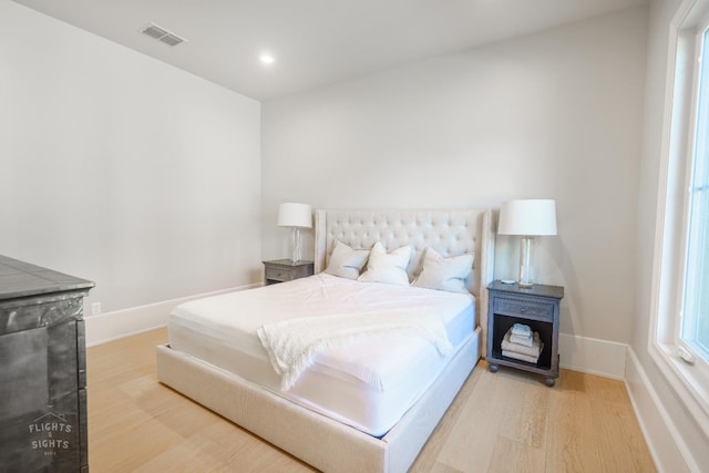 bedroom featuring wood-type flooring