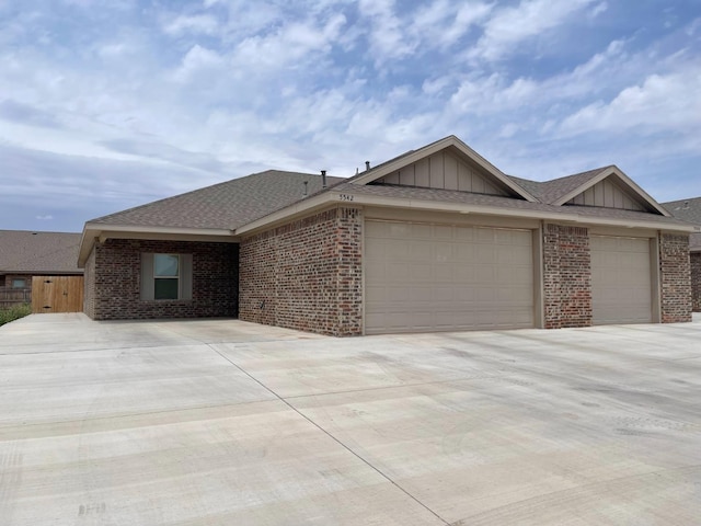 ranch-style house featuring a garage