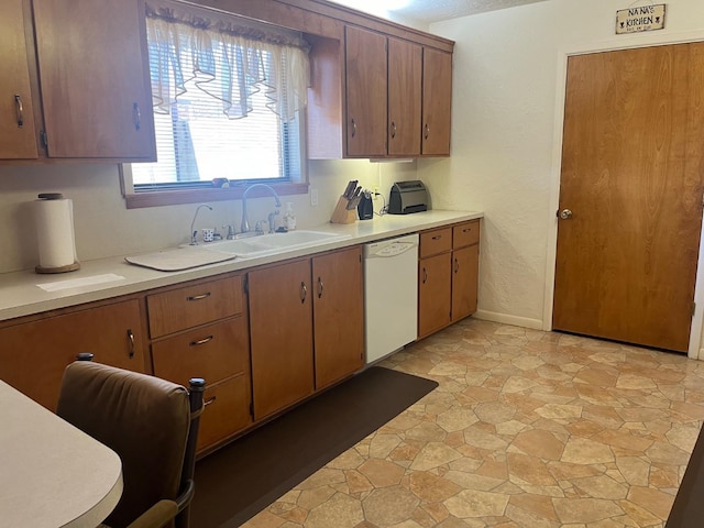 kitchen featuring sink and dishwasher