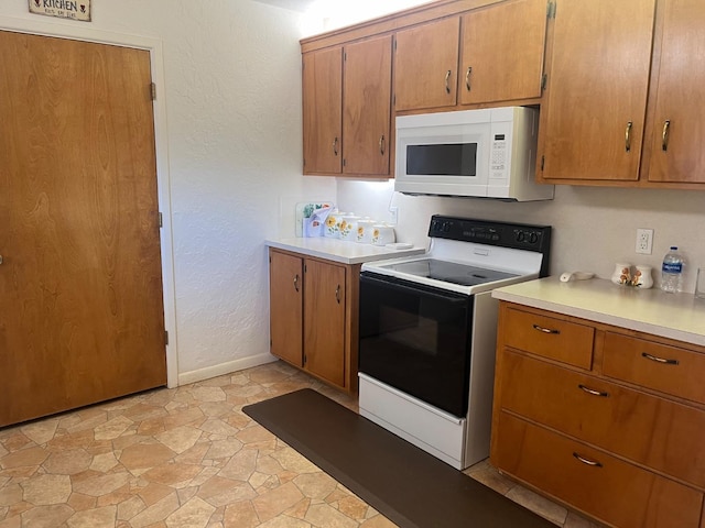 kitchen featuring range with electric stovetop