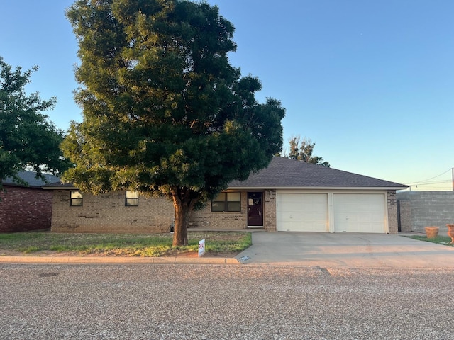 view of front of property featuring a garage