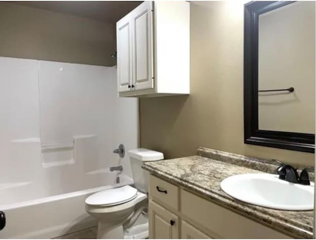 full bathroom with vanity, toilet, and shower / bath combination