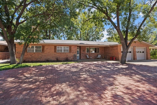 single story home with a garage