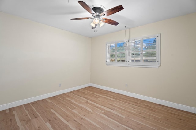 spare room featuring ceiling fan and light wood-type flooring