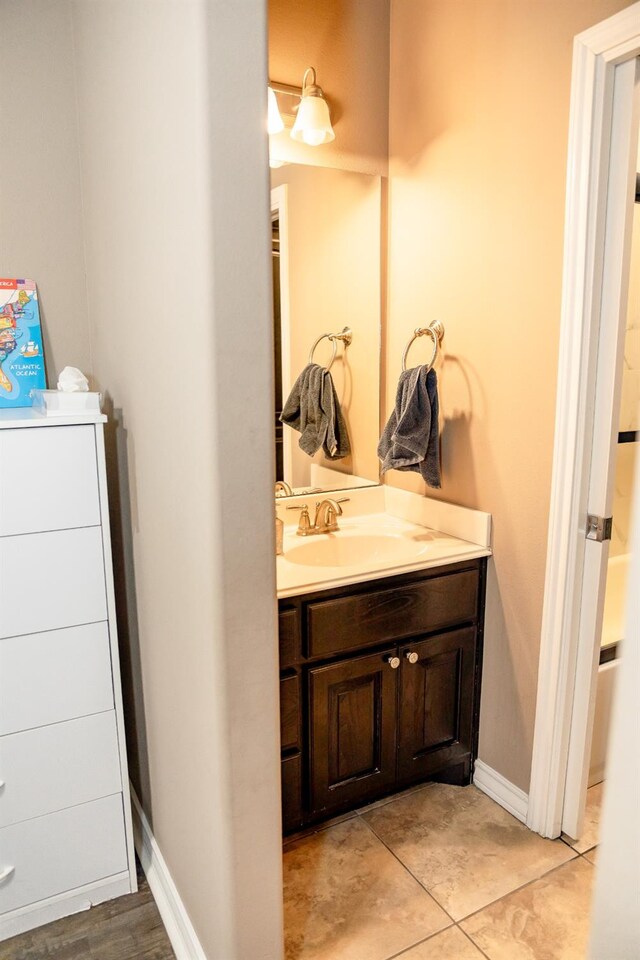 bathroom featuring vanity and tile patterned floors