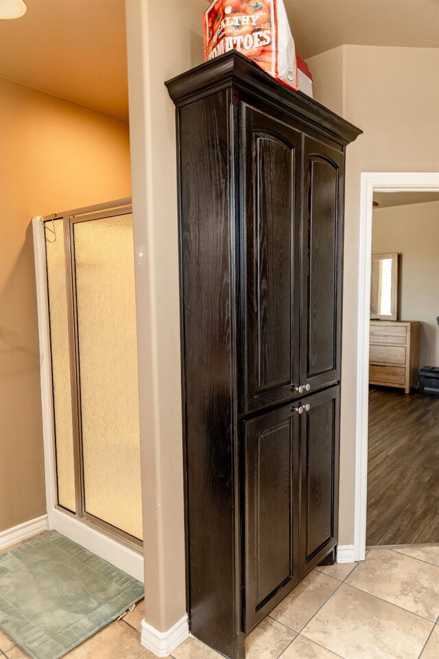 bathroom featuring tile patterned flooring