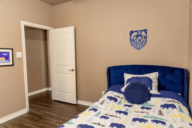 bedroom featuring wood-type flooring