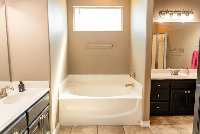 bathroom featuring vanity, plus walk in shower, and tile patterned flooring