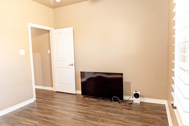 unfurnished room featuring hardwood / wood-style flooring