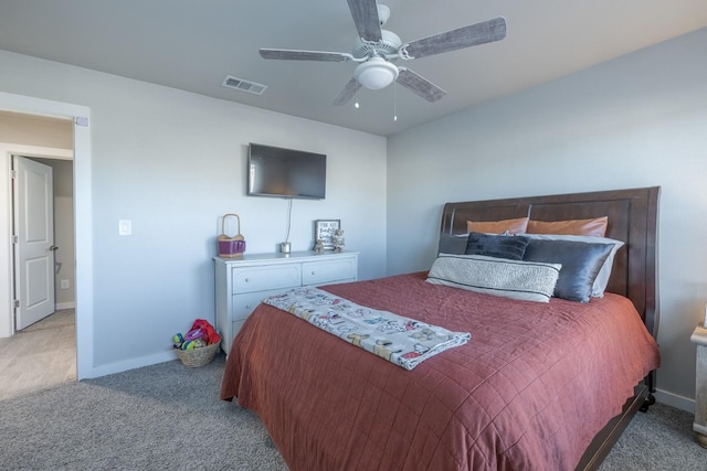 carpeted bedroom with ceiling fan