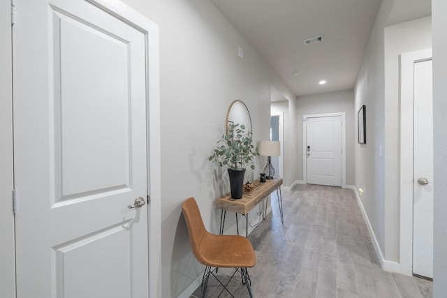 hall featuring light hardwood / wood-style floors