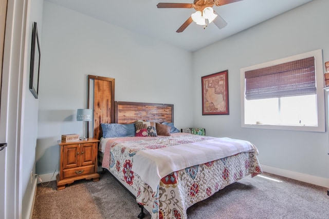 bedroom with dark carpet and ceiling fan