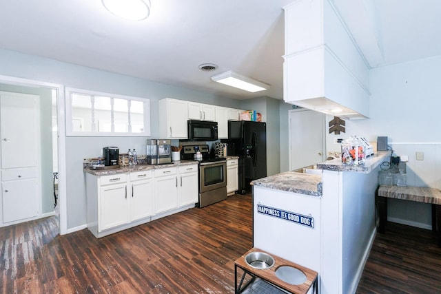 kitchen with dark wood-type flooring, black appliances, kitchen peninsula, stone counters, and white cabinets