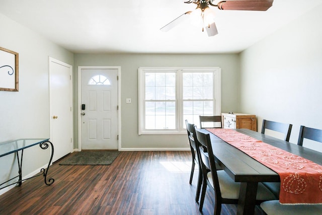 dining space with dark hardwood / wood-style floors and ceiling fan