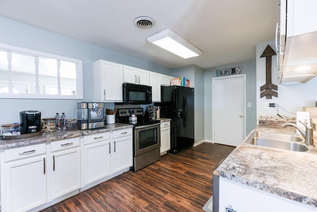 kitchen featuring sink, black appliances, dark hardwood / wood-style floors, and white cabinets