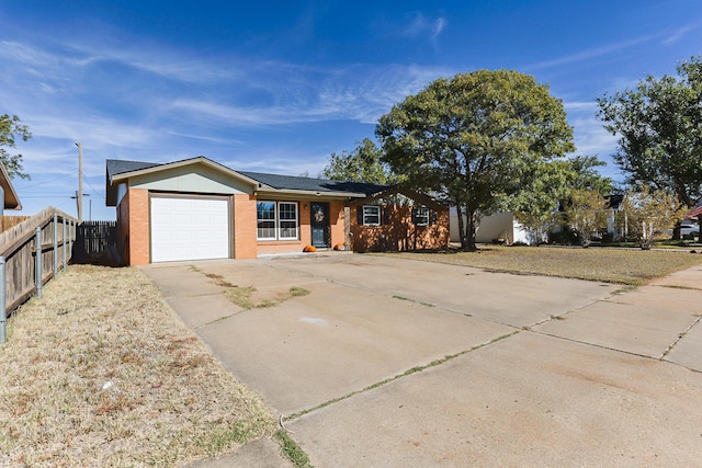 ranch-style home with a garage