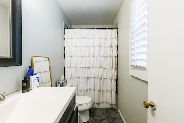 full bathroom with shower / bathtub combination with curtain, vanity, and toilet