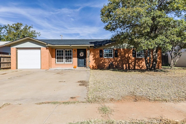 ranch-style house featuring a garage