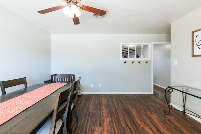 dining space featuring dark hardwood / wood-style floors and ceiling fan