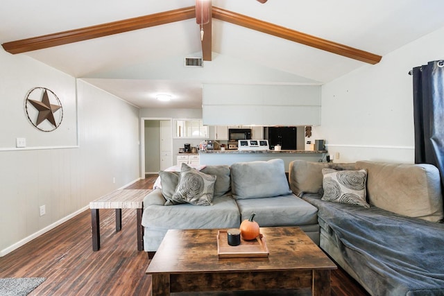 living room with vaulted ceiling with beams and dark hardwood / wood-style floors