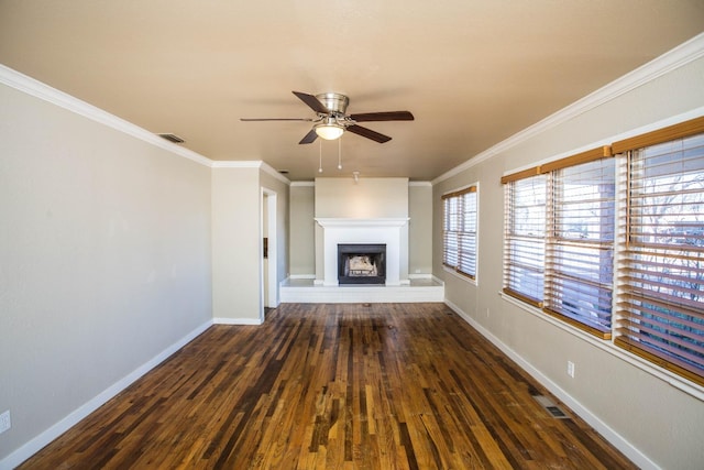 unfurnished living room with ornamental molding, dark hardwood / wood-style floors, and ceiling fan