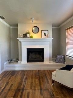 unfurnished living room with crown molding and dark hardwood / wood-style floors