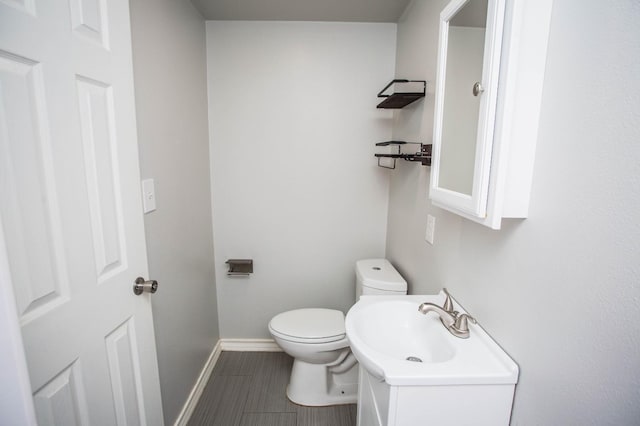 bathroom with toilet and sink