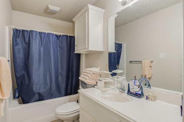 full bathroom with shower / bathtub combination with curtain, vanity, toilet, and a textured ceiling