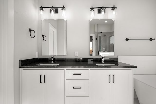 7814 96th St, Lubbock, TX 79424 - full bathroom with a shower stall and double vanity