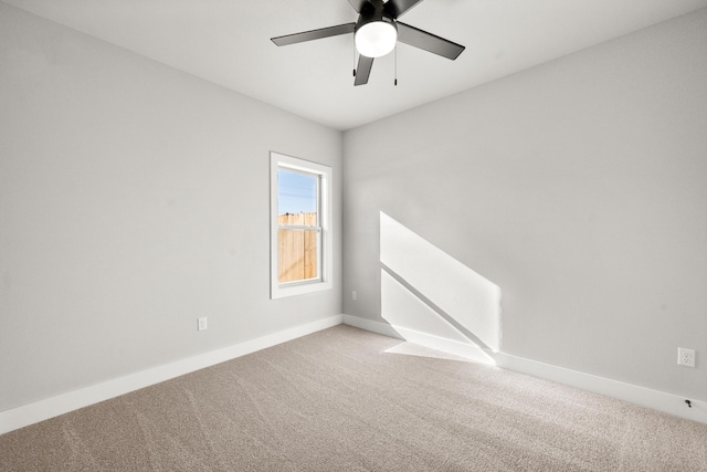 7814 96th St, Lubbock, TX 79424 - empty room with carpet floors, a ceiling fan, and baseboards