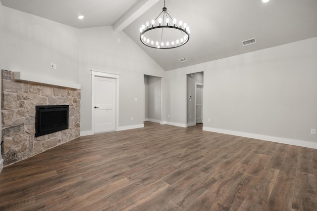 7814 96th St, Lubbock, TX 79424 - unfurnished living room featuring beamed ceiling, high vaulted ceiling, a chandelier, wood finished floors, and a stone fireplace