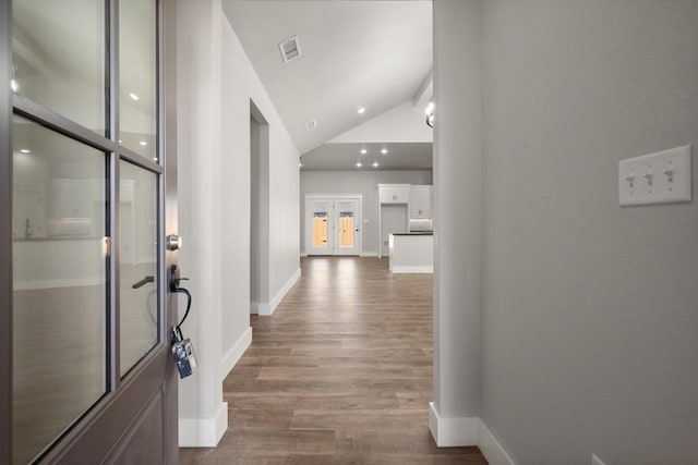 7814 96th St, Lubbock, TX 79424 - entryway with french doors, vaulted ceiling, dark wood-style floors, baseboards, and recessed lighting