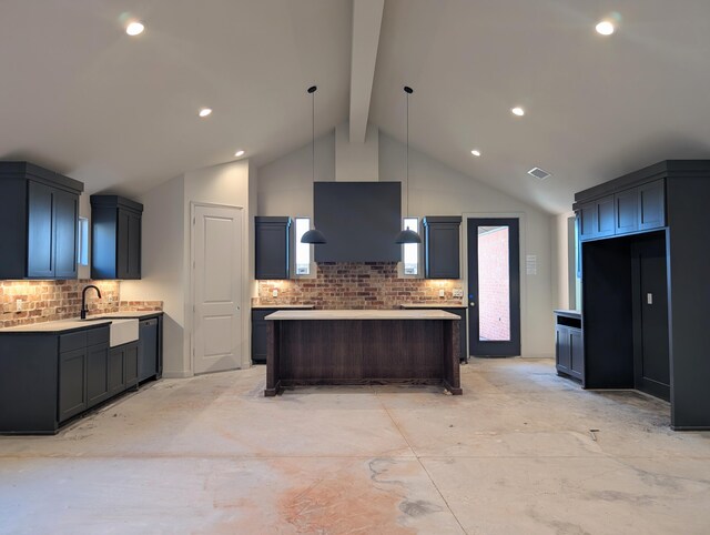 kitchen with tasteful backsplash, beam ceiling, visible vents, and a kitchen island