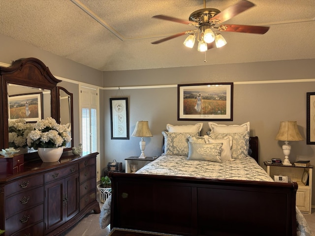 bedroom featuring a textured ceiling and a ceiling fan