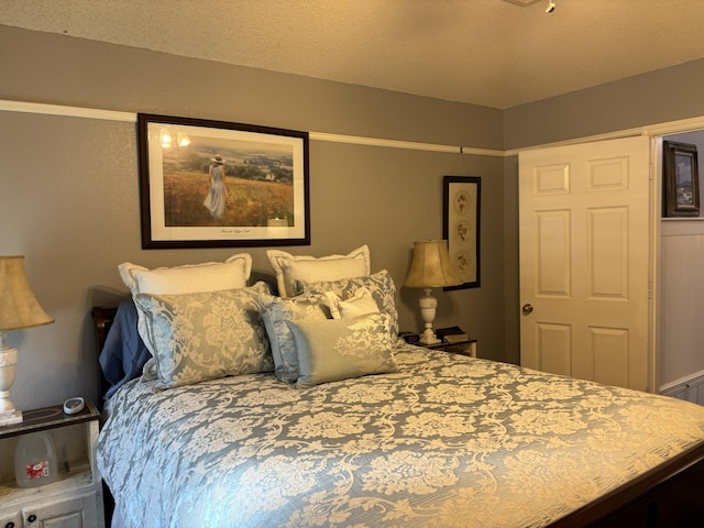 bedroom with a textured ceiling