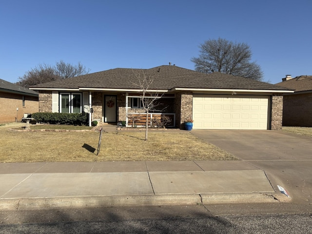 single story home featuring a garage, brick siding, concrete driveway, and roof with shingles