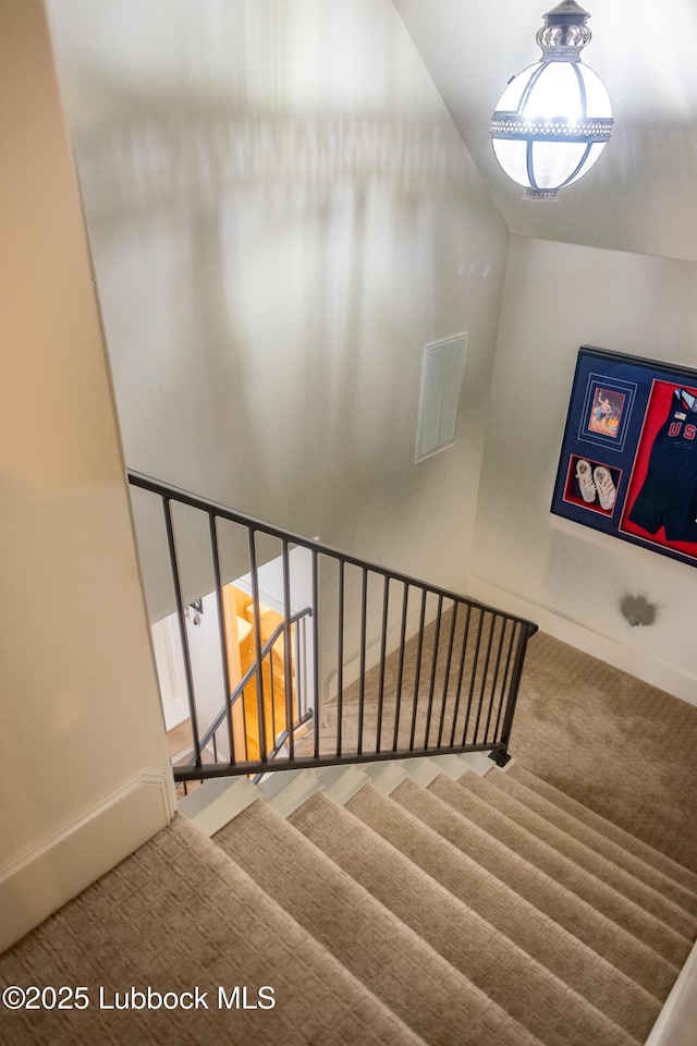 11707 Uxbridge Ave, Lubbock, TX 79424 - staircase with carpet and baseboards