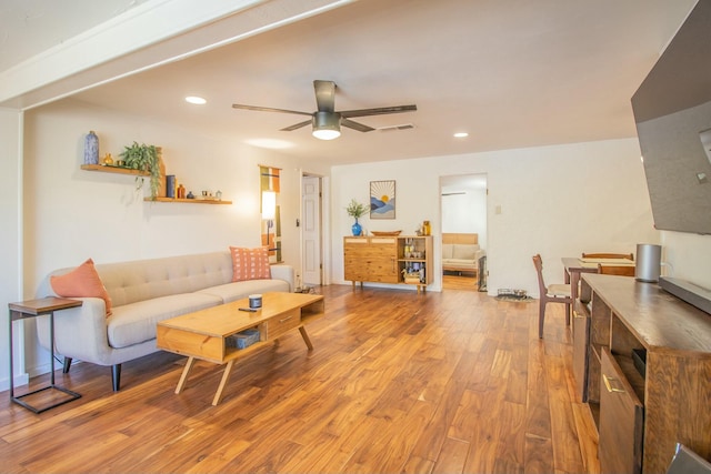 living room featuring recessed lighting, visible vents, wood finished floors, and a ceiling fan