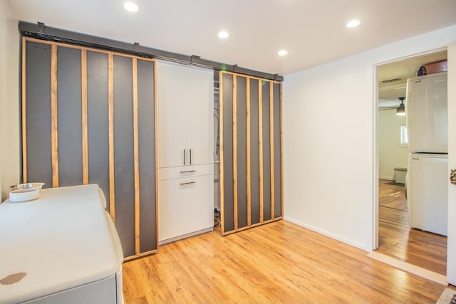 basement with recessed lighting and light wood-type flooring