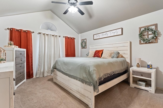 carpeted bedroom featuring ceiling fan and lofted ceiling