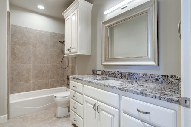 full bathroom with vanity, toilet, tile patterned floors, and tiled shower / bath