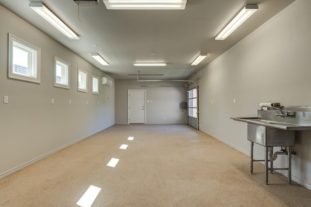 carpeted empty room featuring a wealth of natural light and a wall mounted AC