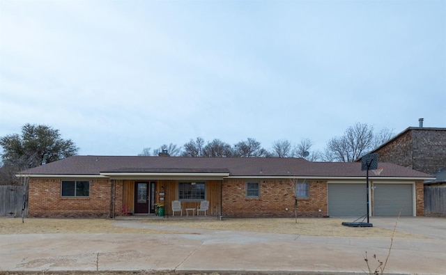 ranch-style home featuring a garage