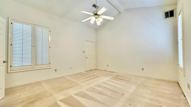 spare room featuring beamed ceiling, ceiling fan, high vaulted ceiling, and light carpet