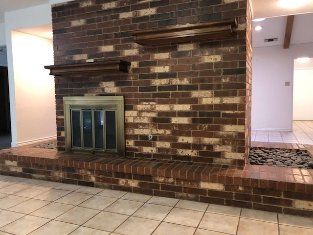 3423 94th St, Lubbock, TX 79423 - detailed view of a brick fireplace and beamed ceiling
