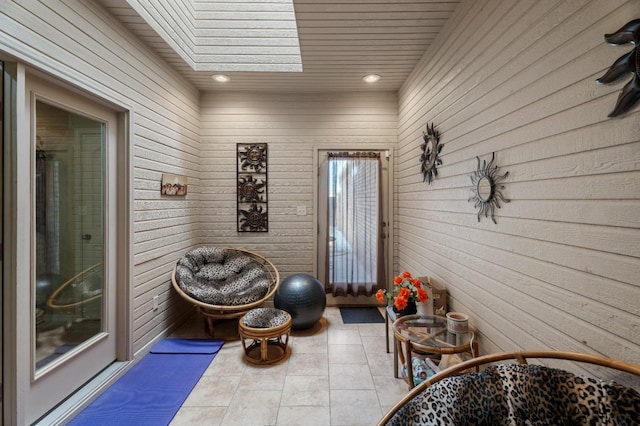 sitting room with tile patterned floors