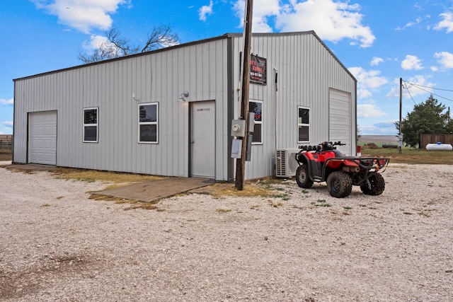 view of outbuilding featuring a garage