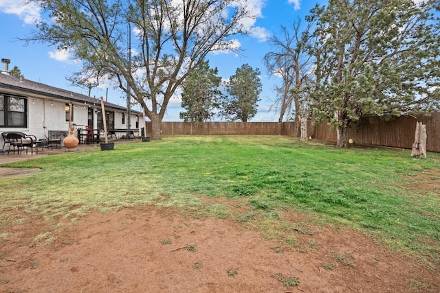 view of yard with a patio area