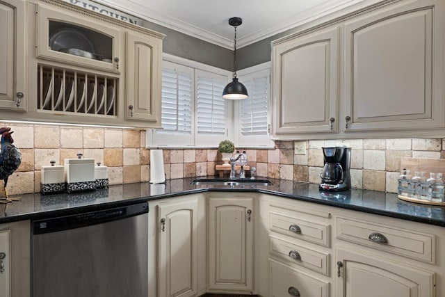 kitchen with sink, crown molding, dishwasher, cream cabinets, and decorative backsplash